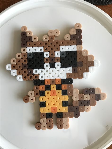 Rocket Raccoon Perler Beads. Guardians of the Galaxy Guardians Of The Galaxy Perler Beads, Rocket Perler Beads, Marvel Perler Beads, Hamma Beads Ideas, Easy Perler Bead Patterns, Pixel Beads, Fusion Beads, Perler Bead Templates, Rocket Raccoon