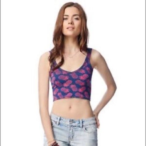 PINEAPPLE CROP TOP NWT LARGE AEROPOSTALE Cute pineapple top! Purchased but never worn or tried on. Retails at $19.50 + tax. Flat measurements: armpit to armpit 15", top strap to hem 15.5" mid back to hem 8", mid front to hem 7". Navy blue with pink/fuchsia pineapples. 94% cotton, 6% spandex. Made in Cambodia. Aeropostale Tops Crop Tops Pineapple Graphic, Cute Pineapple, Layering Tank Tops, Black Cropped Tank, Style Tank Top, Crop Tank Top, Lace Tank Top, Cropped Tank Top, Black Tank Tops