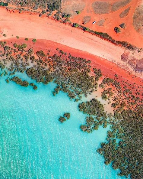 In this image the aquamarine water of Roebuck Bay rolls onto red sand in Broome Western Australia. A coastal town Broome is home to roughly 14000 people but its population can grow to upwards of 45000 per month during peak tourist season from June to August. .  @dailyoverview . . . . . . . . . . #australiagram_nsw #australiagirl #takemetoaustralia #loveaustralia #tourismaustralia #thisisaustralia #seesouthaustralia #australianlife #australia_shotz #australiagram #dronephotography #dronepixel #dr Broome Western Australia, Australia Landscape, Red Sand Beach, Red Sand, Coastal Towns, Aerial Photography, Luxor, Travel Inspo, Australia Travel