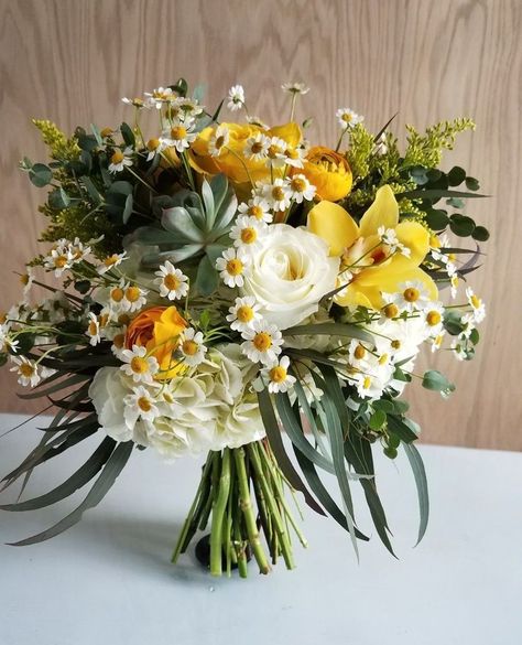 Yellow Ranunculus Bouquet, Yellow Roses Wedding Decor, Yellow Green And White Wedding Decor, Green Yellow White Wedding, Yellow And White Wedding Florals, Yellow And Green Bouquet, Cymbidium Orchids Bouquet, September Flower Arrangements, Floral Columns Wedding