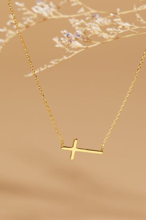 Wear this delicate gold cross as any every day wear piece! It’s simple yet stylish and meaningful. Makes the perfect gift!   	9” length (adjustable) 	Clasp closure 	Imported Tiny Gold Cross Necklace, Dainty Jewelry Aesthetic, Cross Necklace Aesthetic, Jewelry Inspo Gold, Cross Gold Necklace, Catholic Cross Necklace, Burr Basket, Jewelry Cross Necklace, Necklaces Cross