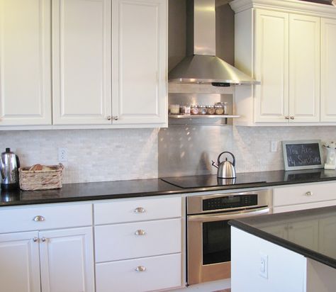 Black quartz with sparkle, cream and grey dry stacked backsplash with a little shimmer, white cabinets. Brushed chrome hardware. Backsplash Behind Stove, Stainless Steel Backsplash, Sunflower Kitchen Decor, Steel Backsplash, City Farmhouse, Stainless Backsplash, Kitchen Refresh, Kitchen Backsplash Designs, Kitchen Bathroom Remodel