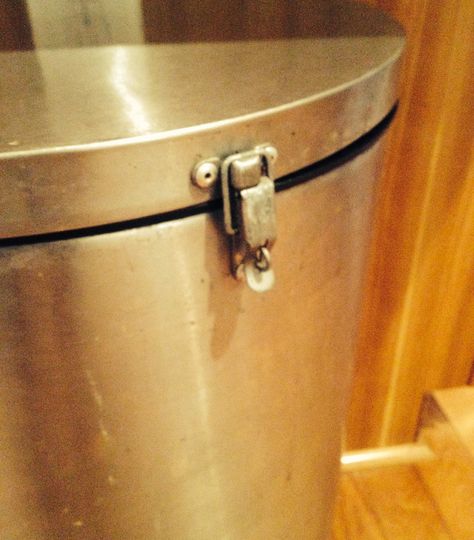 We have a stainless steel flip lid trash can in our kitchen. The hope was that the dog would not get into it, wrong. Bring on the second line of defense. I had several small hasps (locks, buckles, ???)out in the garage, so it was a very quick and easy hack to challenge his garbage eating ability. I set the can on its side, and laid the hasp on the front of the can. Half on the lid, the other half on the can (as it would be when closed and locked) and marked the holes with a sharpie. I drilled... Clean House Checklist, Dog Proof Trash Can, Cordless Drill Reviews, Pull Out Trash Cans, Cereal Containers, Your Trash, Can Lids, Spring Cleaning Hacks, House Cleaning Checklist