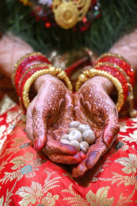 A bride holds betel nuts during a supari ceremony - 18 Nepali Wedding Traditions Explained | Full Time Explorer | Nepali Culture | Nepalese Traditions | Newari Wedding | Hindu Wedding | Significance and Meaning | Wedding Ceremony | Reception | Supari | Janti | Foreign Bride | Multicultural Wedding | Learning About Other Cultures | Weddings Around the World #nepal #nepali #hindu #wedding #newari Nepali Wedding Reception, Nepali Wedding Photography, Nepali Bride Wedding Nepal, Newari Wedding, Nepali Wedding Dress, Begnas Lake, Nepalese Wedding, Wedding Receiving Line, Nepali Aesthetic