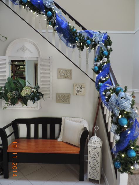 My front entrance staircase garland, this years theme , cobalt blue, turquoise, and silver dragonflies Dec 2014 Entrance Staircase, Staircase Garland, Christmas Banister, Beauty Rooms, Christmas Stairs Decorations, Blue Christmas Tree Decorations, Christmas Staircase Decor, Christmas Stairs, Chirstmas Decor