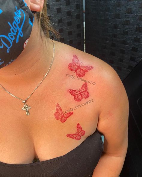 Red Tattoo Collar Bone, Red Heart Between Chest Tattoo, Red Butterfly Back Tattoo, Red Ink Collar Bone Tattoo, Red Ink Tattoos Chest, Red Collarbone Tattoo, Red Heart Tattoo On Chest, Red Chest Tattoo, Red Butterfly Tattoo