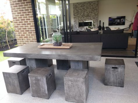 PHOTO 6: Concrete outdoor table with metal chairs that cover with cement. It is a clever idea to use for outdoor as it is tough enough to withstand the weather and still gives you the elegant look to the place. It works well with any industrial, rustic, or contemporary design of a home. Outdoor Concrete Table And Chairs, Table With Metal Chairs, Concrete Dining Room, Concrete Outdoor Dining Table, Fire Pit Coffee Table, Concrete Outdoor Table, Cement Table, Concrete Interiors, Wood And Concrete