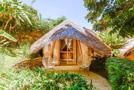 Air-conditioned Bamboo Bungalow @ Le Bamboo Bali - Earth houses for Rent in Uluwatu, Bali, Indonesia Bamboo Huts Ideas, Bamboo Bungalow, Bamboo House Bali, Bamboo Hut, Earthen Home, Amazing Airbnb, Earth Houses, Hotels In Bali, Bali Uluwatu