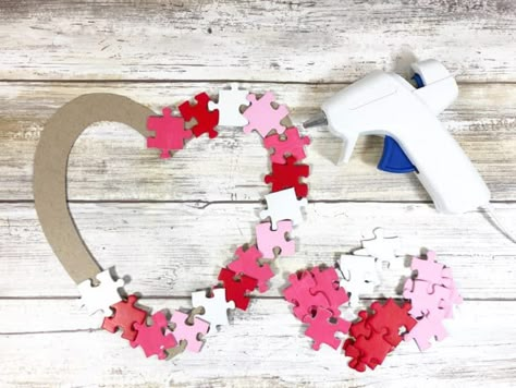 Puzzle Piece Heart Craft, Crafts With Puzzle Pieces Diy, Love You To Pieces Craft, Puzzle Piece Crafts Art Projects, Puzzle Wreath, Puzzle Pieces Crafts, National Puzzle Day, Jigsaw Puzzle Crafts, Puzzle Piece Art