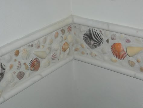 I wanted to do something with all the shells I have collected over the years.  This is my creation.  It is so cool.  The shell strip goes completely around my bathroom wall.  I love it. Seashell Bathroom Decor, Maximalist House, Seashell Bathroom, Beachy Aesthetic, Beach Theme Bathroom, Casa Country, Wall Borders, Beachy Decor, Room Walls