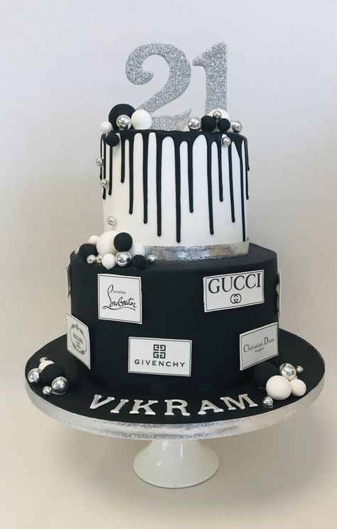 2 tier 21st Birthday cake in monochome black and white with a touch of silver including favourite designer logos 2 Tier 21st Birthday Cake, Black And White 21st Cake, Black And Silver Cake For Men, Black And Silver Cake Ideas, 21th Birthday Cake, Birthday Cake Black And Silver, Black White And Silver Birthday Cake, Black And Silver Birthday Cake, Black And Silver 21st Birthday Cake