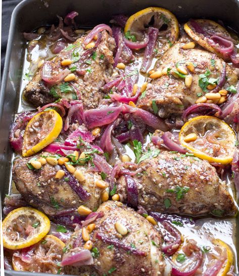 Here's an amazing roast chicken recipe from chef Yotam Ottolenghi. Chicken thighs are spiced with za'atar and sumac, tossed with onions, lemons and garlic, and roasted. This is a great dinner party recipe because it's a beautiful dish, you can do all the prep ahead, the chicken is tender and juicy, and the flavors are fantastically delicious! Ottolenghi Chicken, Roast Chicken Thigh Recipes, Yotam Ottolenghi Recipes, Roast Chicken Recipe, Ottolenghi Recipes, Roasted Chicken Thighs, Good Roasts, Za Atar, Roast Chicken Recipes