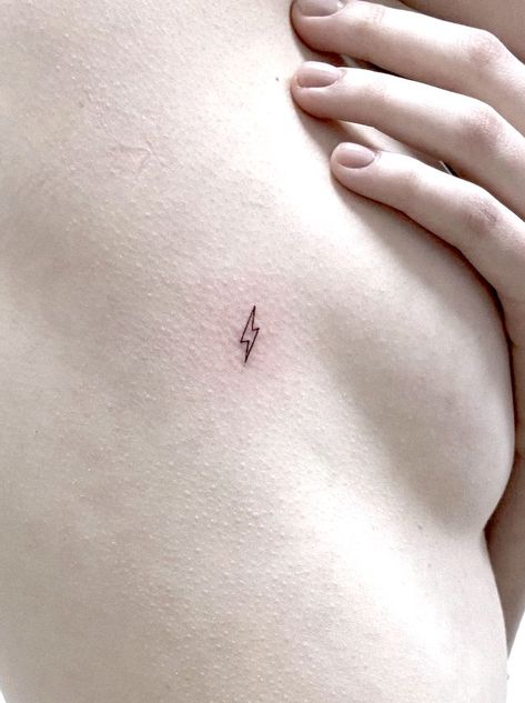 38 Small Meaningful Tattoos That Are Permanent Reminders Yes Please Tattoo, Tatoos Small Meaningful For Loss, Small Tattoos Freedom, Lightning Bolt Meaning, Onward And Upward Tattoo, Subtle Feminist Tattoo, Freedom Tattoo Ideas For Women, Divorce Tattoos For Women, Lightning Bolt Tattoo Meaning