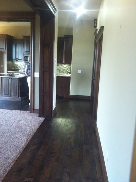 Dark Floor - Dark Trim (I think I like White baseboards with a dark floor, instead) Floor Paneling, Rental Updates, Lakehouse Design, Stained Wood Trim, Paint Floor, Dark Wood Trim, Hardwood Floors In Kitchen, Trim Paint, Dark Trim