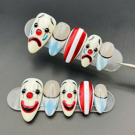 Add a playful twist to your look with our 3D Moody Circus Clown Press on Nails. These custom, reusable press ons feature bright, happy, and sad clown faces on French tips, perfect for a trendy and lively vibe. Ideal for short or long false nails with a cheerful circus flair. 🌸Thank you for supporting my small business.🌸 You can reuse all the nails you purchased from us multiple times, if you handle them with care 📦𝐖𝐡𝐚𝐭 𝐜𝐨𝐦𝐞𝐬 𝐰𝐢𝐭𝐡 𝐲𝐨𝐮𝐫 𝐩𝐫𝐞𝐬𝐬 𝐨𝐧 𝐧𝐚𝐢𝐥 𝐤𝐢𝐭? 10 𝘯𝘢? Kewpie Nails, Halloween Nails Clown, Cute Clown Nails, Short Clown Nails, Jester Nails, Scary Clown Nails, Clown Acrylic Nails, Circus Nails Designs, Halloween Clown Nails