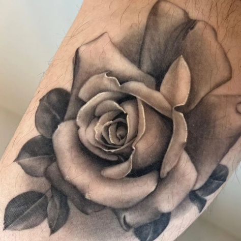 Enter the realm of timeless beauty with @katarina.heinze's realistic black and gray rose tattoo. Each intricately shaded petal captures the essence of nature's elegance, blooming eternal in ink. 🌹🖤⁠

#rosetattoo #blackandgreytattoo #realism #realistictattoo #saskatoontattoo #yxetattoo ( #📷 @katarina.heinze ) Black And Gray Rose Tattoo, Gray Rose Tattoo, Black And Grey Rose Tattoo, Black And White Flower Tattoo, Black And Grey Rose, Mama Tried, Floral Tattoos, Best Tattoo, Hidden Gem