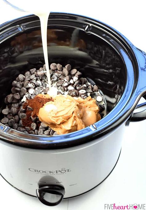 Slow Cooker Chocolate Peanut Butter Fondue ~ a decadent, glossy, chocolate dessert recipe kissed with peanut butter, the perfect crock pot dip for your favorite fruit and confections on Valentine's Day or any day! | FiveHeartHome.com Slow Cooker Fondue Chocolate, Fondue Recipes Chocolate Melting Pot Peanut Butter, Chocolate Dip In Crockpot, Fondue Recipes Crockpot, Diy Fondue Pot Ideas, Dessert Fondue Board, Crockpot Fondue Chocolate, Crockpot Cheese Fondue, Chocolate Fondue Recipe Melting Pot