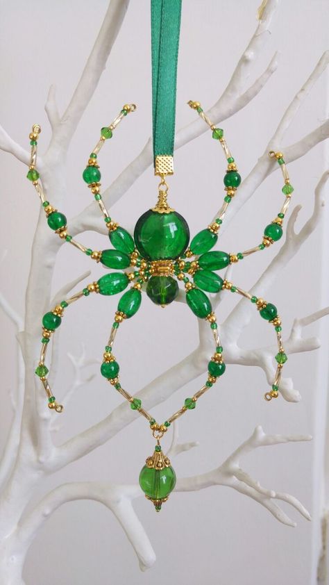 my new emerald green suncatcher SOLD | Beaded jewelry, Diy wire jewelry, Wire jewelry designs Beaded Spiders How To Make, Insect Jewelry Diy, Bead Art Ideas, Mini Suncatchers, Bead Projects Ideas, Green Suncatcher, Bead Spiders, Bead Bugs, Bead Spider