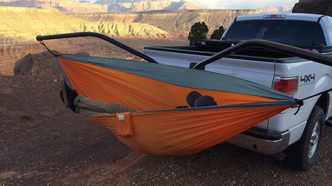 This hammock hitch stand turns your truck into a relaxation station Hammock Chair Stand Diy, Hammock Stand Diy, Wooden Hammock Stand, Wooden Hammock, Hammock Chair Stand, Relaxation Station, Diy Hammock, Truck Bed Camper, Trailer Hitch Accessories