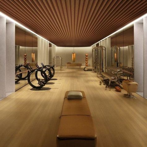 Fitness center, wood slat ceiling, perimeter linear light Modern Home Gym Design, Modern Home Gym, Gym Lighting, Gym Design Interior, Bedroom Inspirations Minimalist, Basement Gym, Gym Room At Home, Gym Interior, Best Home Gym