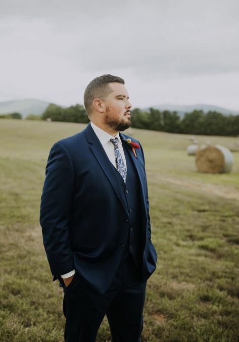 Navy blue is making a strong comeback as a versatile and timeless choice. Navy blue groom and groomsmen suits provide a fresh alternative to black, offering a refined yet contemporary look. Perfect for both formal and outdoor weddings, this color adds depth and elegance without overshadowing the bride. Navy blue suits are a great match for various color palettes, complementing everything from neutrals to bold accent colors. From navy blue to the bold choices of burgundy and emerald green, Amanda’s Touch offers what 2025 grooms are looking for. Navy Blue Suits, Navy Blue Groom, Tuxedo Styles, Blue Groom, Tuxedo Prom, Groom And Groomsmen Suits, Burgundy Tuxedo, Green Tuxedo, Blue Suits