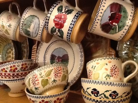 A collection of whimsical Nicholas Mosse mugs and bowls Spongeware Pottery, Nicholas Mosse Pottery, Wildflower Cottage, Painting With Flowers, Nicholas Mosse, Irish Pottery, Tiny Bowls, Kitchen Updates, Kitchen Dresser