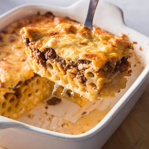 A triple-decker composition of tubular pasta, spiced meat sauce, and lush béchamel, Greek pastitsio is king among casseroles—and often a royal pain. Greek Pastitsio, Cooks Illustrated Recipes, Donut Toppings, Caramel Chocolate Bar, Brown Recipe, Cookie Toppings, America's Test Kitchen Recipes, Cooks Illustrated, America's Test Kitchen