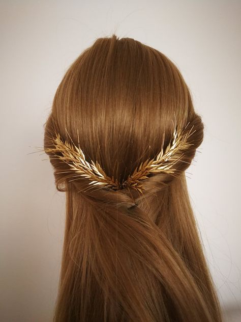 "Wheat is a timeless symbol of the bounty of nature and the golden days of harvest. Adding this symbol to one's wedding day is really meaningful. This piece is easy to wear. Easily be shaped for a comfortable fit. This item is handmade. The price is valid for 2pcs. Our Blé No.1 bridal hair piece is perfectly matching with our following style: **Blé No.2 - Gold wheat bracelet, Bridal bracelet , Wedding jewelry https://www.etsy.com/listing/685890202/ble-no2-gold-wheat-bracelet-bridal?ref=shop_home Wheat Wedding, Gold Wedding Hair Piece, Gold Hair Piece, Goddess Crown, Wedding Hair Jewelry, Wire Headband, Bridal Hair Piece, Hair Jewellery, Bridal Earrings Drop