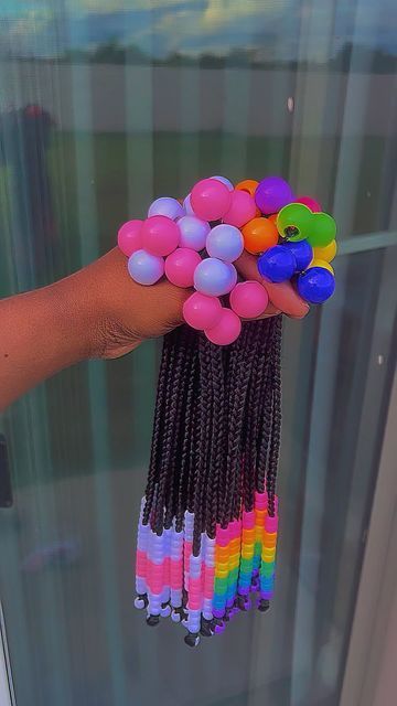 How To Put Pony Beads In Hair, Braided Ponytail With Beads, Rainbow Braids For Kids, Beaded Bubble Braids, Raindrop Braids Beads, Soulaan Culture, Rainbow Beads Hair Braids, Kids Braided Ponytail With Beads, Kids Braids With Beads