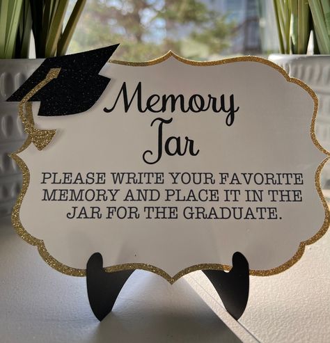 NOTE: THERE ARE 2 DIFFERENT DESIGNS AND SIZES IN MY SHOP. Add this Memory sign to your graduates party.  Pick your colors to match the party. Includes 25 note cards in white Cardstock  to match the signs design. 1 Piece Sign Measures 7x5 Paper easel not included but sold in my shop. https://www.etsy.com/listing/1197168659/paper-easel-sign-holder-graduation?click_key=0a7e4a26e7e1c7cb02022dfc81b1c6563cd4f044%3A1197168659&click_sum=15e37fb5&ref=shop_home_active_37&crt=1&sts=1 Graduation Party Words Of Wisdom Jar, Graduation Display Table, Memory Jar Graduation, Graduation Party Colors, Graduation Display, Graduation Party Desserts, Modern Graduation Party, College Grad Party, Graduation Memories