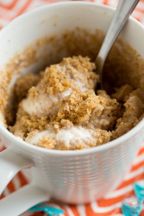 Pumpkin spice mug cake topped with creamy vanilla bean ice cream is Fall perfection...in a mug! Literally! Recipe on tablefortwoblog.com Pumpkin Spice Mug Cake, Spice Mug Cake, Dessert In A Mug, Bean Ice Cream, Table For Two, Pecan Cake, Vanilla Bean Ice Cream, Mug Recipes, In A Mug