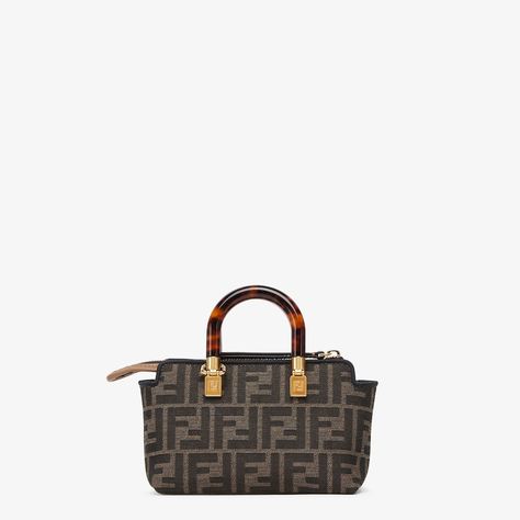 Iconic mini By The Way Boston bag, made of an FF motif jacquard fabric in brown with FENDI ROMA lettering in beige leather. Stiff tortoiseshell-effect plexiglass handles. Zip fastening. Featuring a lined interior with a pocket and gold-finish metalware. The bag can be carried by hand with the handles, or worn either on the shoulder or cross-body with the adjustable, detachable shoulder strap. Made in Italy Fendi By The Way Mini, Fendi By The Way, Boston Bag, Jacquard Fabric, Tortoise Shell, Gold Finish, Cross Body, Boston, The Way