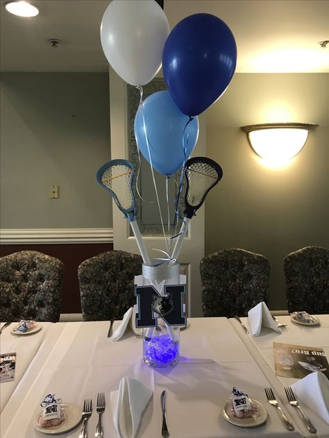 Lacrosse banquet centerpiece Lacrosse Banquet Ideas, Lacrosse Decorations, Lacrosse Party, Sports Centerpieces, Bar Mitzvah Centerpieces, Mitzvah Centerpieces, Lacrosse Quotes, Banquet Centerpieces, Sports Banquet