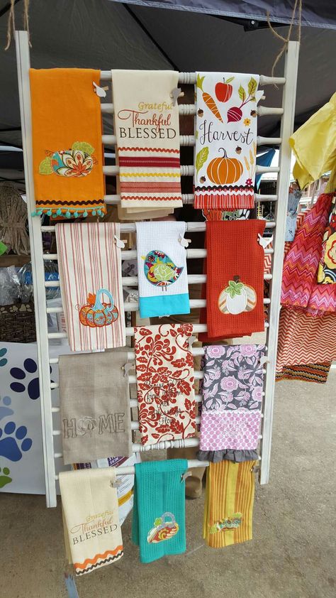 Kitchen Towel Display Craft Show, Embroidery Vendor Booth, Kitchen Towel Display Ideas, Apron Display Ideas Craft Fairs, Embroidery Shop Display Ideas, Towel Display Ideas Craft Fairs, Tea Towel Display Craft Fairs, Quick Easy Crafts, Tea Towel Display