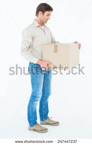 Full length of delivery man carrying cardboard box against white background Asian Squat, Man Stock Photo, Carrying Boxes, Human Poses, Art Poses, Side View, Art Reference Photos, Delivery Man, Art Reference Poses