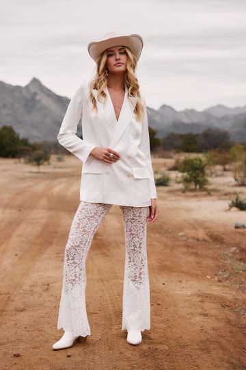 JUST IN: Introducing Malibu Cowboy for the Bride. Bachelorette Bound? Reception Dinner? We got you. Shop now #bridesofthetribe White Lace Pants, 12th Tribe, Bridal Jacket, Satin Blazer, Satin Trousers, Lace Pants, Concert Fits, The Madison, Everyday Chic