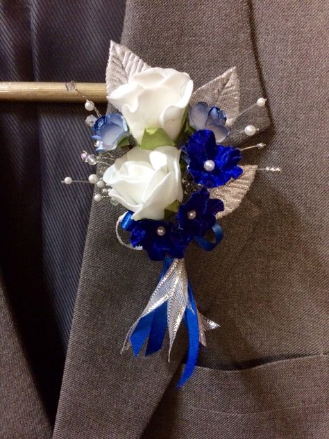 Boutineer Ideas Blue And White, Royal Blue And White Boutonniere, Royal Blue Wedding Groomsmen, Royal Blue And White Flower Bouquet, Royal Blue And Silver Corsage And Boutonniere, Royal Blue And Silver Wedding Decor, Royal Blue Bridal Bouquet, Royal Blue Bouquet Prom, Royal Blue Wedding Theme Groomsmen