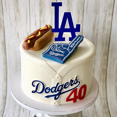 Dodger cake #dodgercake #dodgers #dodgerscake #ladodgers #ladodgerscake #baseballcake #baseball #mlb #mlbcake #hotdogcake #fondanthotdog… La Dodgers Birthday Party, Dodger Party, Hot Dog Cakes, Dodgers Birthday Party, Dodgers Cake, Dodgers Party, Dodgers Gear, Baseball Cake, Baseball Party