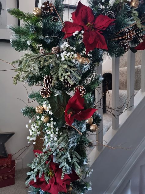 Poinsettia christmas stairway garland. Red and green christmas decor. Rustic christmas garland with red poinsettia flowers foraged branches, berries and pine cones. Rustic Christmas Garland, Christmas Stairway, Red And Green Christmas Decor, Stairway Garland, Green Christmas Decor, Christmas Decor Rustic, Pinecone Garland, Poinsettia Flowers, Red And Green Christmas