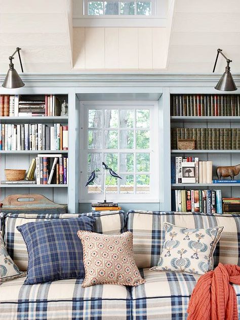 The living room doesn't have to be stuffy and formal.  This one has a cozy, yet traditional feel with a blue and white plaid sofa.  Toss in a few bold pillows and a coral throw for a pop of color.  French blue walls give a nice calming effect.  Built-in bookcases give the room a nice architectural element. Plaid Couch, Checked Sofa, Blue Bookcase, Plaid Sofa, Living Room Cozy, Dream House Living Room, Room Cozy, Trendy Living Rooms, Living Room White