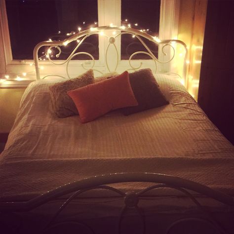 Fairy lights, white metal bed frame white bed Fairy Lights On Bed Frame, White Wire Bed Frame, White Metal Bed Frame Aesthetic, Metal Bed Frame Aesthetic, White Metal Bed Frame Bedroom Ideas, Metal Bed Frame White, Fairy Lights White, White Metal Bed Frame, White Metal Bed