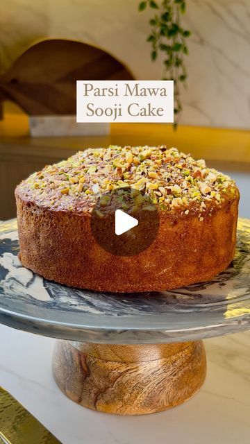 Guntas Sethi on Instagram: "✨Parsi Eggless Sooji Mawa Cake✨  Nothing screams nostalgia better than Parsi eggless sooji mawa cake and this recipe makes for the most scrumptious, moist and soft cake at home that is a delight in every bite✨😋  I got all my ingredients sorted from @ellementryhome that add style and elegance to my kitchen❤  Recipe: -2 tbsp custard powder -1.5 cups warm milk -1.5 tsp vinegar -1/2 cup Maida  -100 grams Mawa  - 3/4 cup superfine rawa  -1/2 cup + 2 tbsp caster sugar -1/2 tsp baking soda -1 tsp baking powder -1/4 tsp elaichi powder - 4 tbsp melted ghee/butter  For the Mawa:   - 2 tbsp Butter  - 1/4 cup Milk  - 1 cup Milk Powder  🍰Chopped Nuts as needed for topping  🍰Bake is at 180 degrees for 40-45 mins or until done.   [chef guntas, chef g, home made, home recipe Eggless Semolina Cake Recipe, Maida Cake Recipe, Sooji Cake Recipe, Eggless Tea Cake Recipe, Mawa Cake Recipe, Custard Powder Recipes, Cakes At Home, Home Made Cake, Butter Cakes