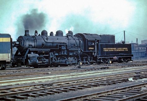 Baltimore & Ohio Chicago Terminal 0-8-0 #1704 appears to be carrying out switching chores at the Lincoln Street Coach Yard on March 25, 1956. Csx Transportation, Baltimore And Ohio Railroad, Chicago Heights, Grand Central Station, Rail Car, Great Western, Downtown Chicago, Blue Island, Forest Park