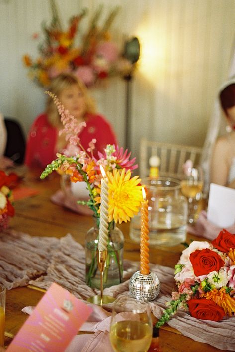 Colorado Disco and bright wedding reception table decor. Wedding Reception Table Decor, Reception Table Decor, Vintage Wedding Table, Wedding Reception Table Decorations, Somerset England, Bright Wedding, Retro Wedding, Film Wedding, Wedding Table Centerpieces