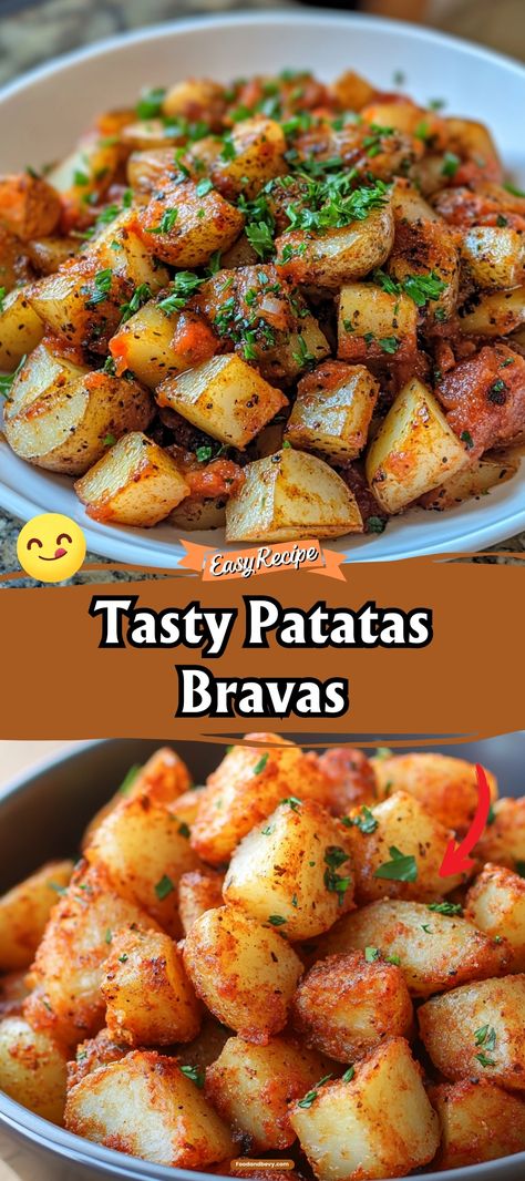 Dive into the bold flavors of Spain with Patatas Bravas, a beloved tapas dish featuring cubes of potato fried to perfection and topped with a spicy tomato sauce and aioli. This dish is a staple in Spanish cuisine, perfect for sharing and guaranteed to spice up any meal. #PatatasBravas #SpanishCuisine #Tapas Potatoes Bravas Recipes, Bravas Potatoes, Potatoes Bravas, Spanish Side Dishes, Potato Bravas, Potato Tomato Recipe, Crispy Roasted Potatoes, Spanish Potatoes, Spanish Tapas Recipes