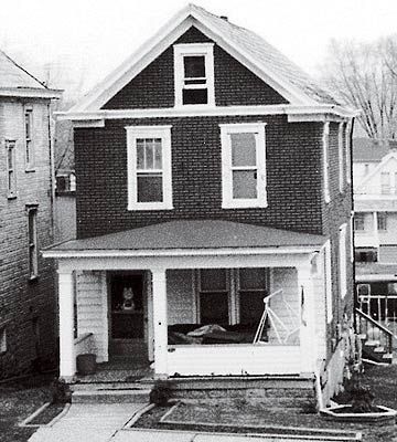 The before photo of this 1910 farmhouse shows a dark, enclosed and uninviting porch. A makeover added Victorian style and more space for outdoor living and entertaining. The peaked roof entryway and gazebo with turret roof both feature hanging baskets overflowing with shade-loving flowers. Enclosed Front Porch Ideas, Enclosed Front Porches, Rustic Outdoor Spaces, Front Porch Remodel, Front Porch Addition, Victorian Porch, Modern Porch, Porch Plans, Porch Remodel