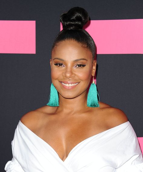 50 Hairstyles That Will Make You Look Younger (For Real!) High Bun With Bangs, Afro Hair Bun, Bun With Bangs, Bangs Cut, Top Knot Bun, Sanaa Lathan, Top Knot Hairstyles, Natural Afro Hairstyles, The Best Hairstyles