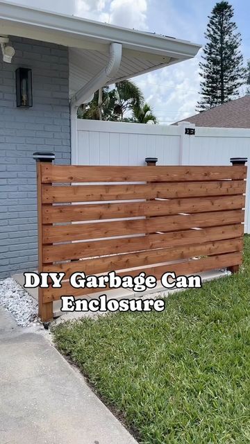 Ashley French | DIY on Instagram: "DIY Garbage Can Enclosure - my most liked project from 2023!🤩 Comment FENCE below and I will send you the step by step directions on how we built it with the supply list right to your DMs! This is definitely the most practical and used project we have ever done and we are so happy we did it! . #homeimprovement #homerenovation #landscaping #exteriordesign #hardscape #diy #diyhome" Diy Garbage Can, Garbage Can Enclosure, Garbage Can Shed, Privacy Fence Landscaping, Hide Trash Cans, Diy Privacy Fence, Vinyl Privacy Fence, Outdoor Trash Cans, Cheap Fence