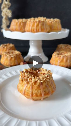 435K views · 37K reactions | Cinnamon Cakes Recipe 👩🏻‍🍳

Welcome to a sensory celebration where aromatic cinnamon meets nutty undertones, creating a culinary experience in every bite. These mini bundt cakes are not just a sweet delight but a feast for the palate.

📝  Ingredients:

For 12 mini bundt molds, each with a diameter of 7 cm:

For the Cake:

- 200 g all-purpose flour
- 30 g ground nuts (hazelnut or walnut)
- 1.5 teaspoons baking powder
- A pinch of salt
- 1-2 teaspoons ground cinnamon
- 100 g soft butter
- 100 g sugar
- 2 eggs (room temperature)
- 1 teaspoon vanilla extract
- 100 ml milk

For the Cinnamon Glaze:

- 100 g powdered sugar
- 1 teaspoon ground cinnamon
- 2-3 tablespoons milk

👩🏻‍🍳 Preparation :

1. Preheat the oven to 180 degrees Celsius. Grease the mini bundt m Cinnamon Cakes, Cinnamon Cake Recipes, Cinnamon Glaze, Mini Bundt, Mini Bananas, Cinnamon Cake, Mini Bundt Cakes, Culinary Experience, Bundt Cakes