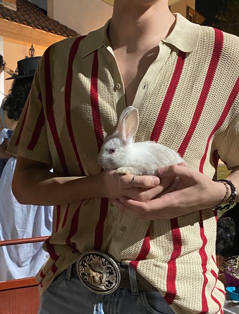 cute baby bunny small white bunny cowboy aesthetic cowboy belt cute outfit men Holding Bunny Reference, Bunny Outfit Male, Guy In Bunny Suit, Smiling Boy Aesthetic, Cute Outfit Men, Holding A Bunny, Aesthetic Cowboy, Dad Aesthetic, Earth Baby